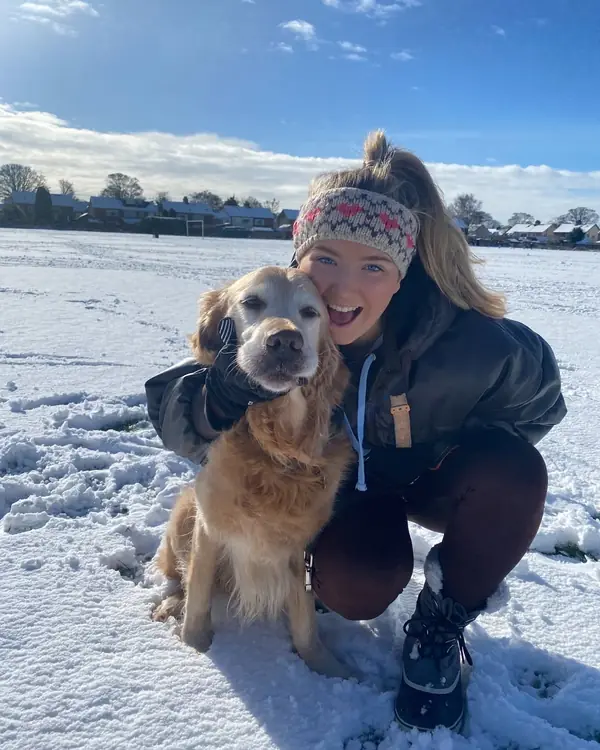Me and Barnaby the golden retriever in the snow